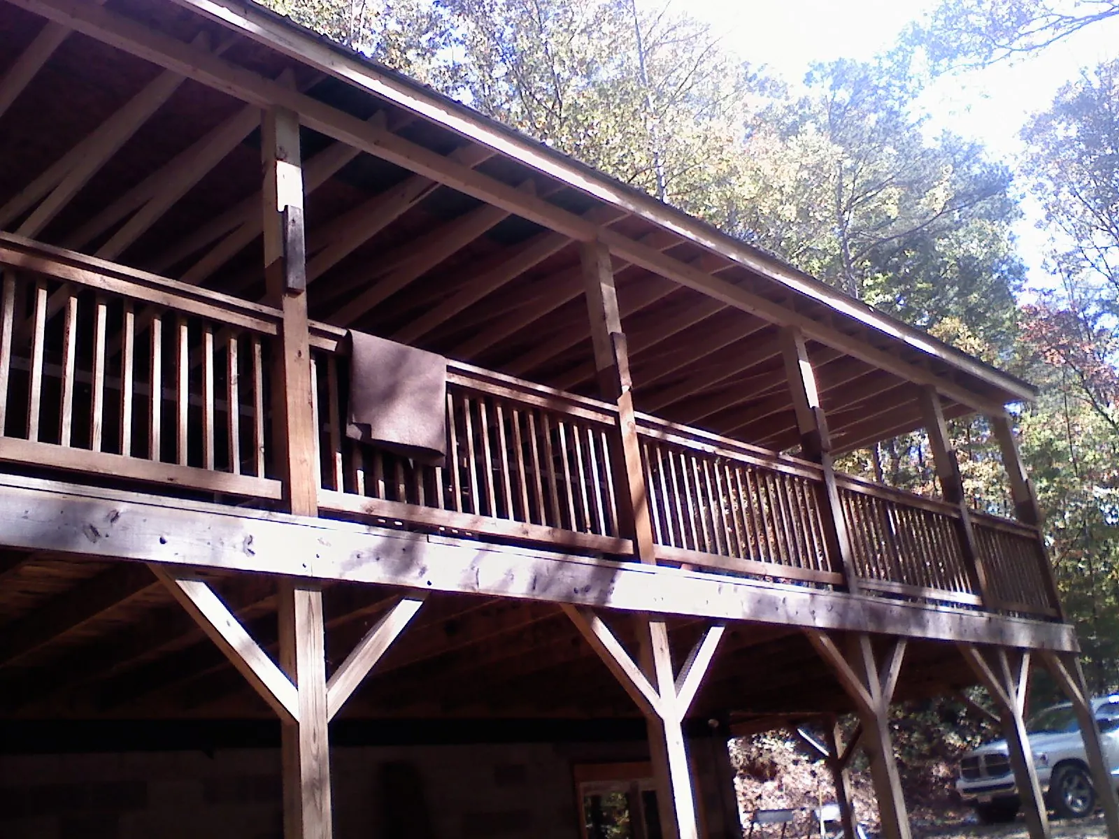 Timber framing under a new elevated porch and deck — Roof Leak Repair in Detroit Lakes by Roofing Brothers